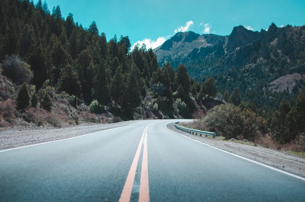 An open road in a beautiful landscape.