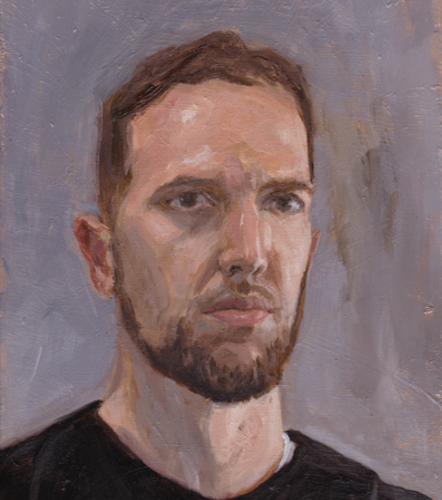 A photo a man with brown hair.
